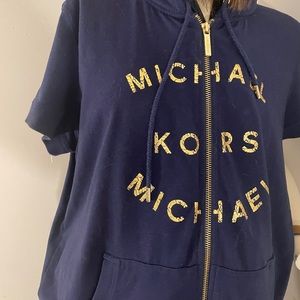 Michael Kors tracksuit. Short sleeve gold letters.